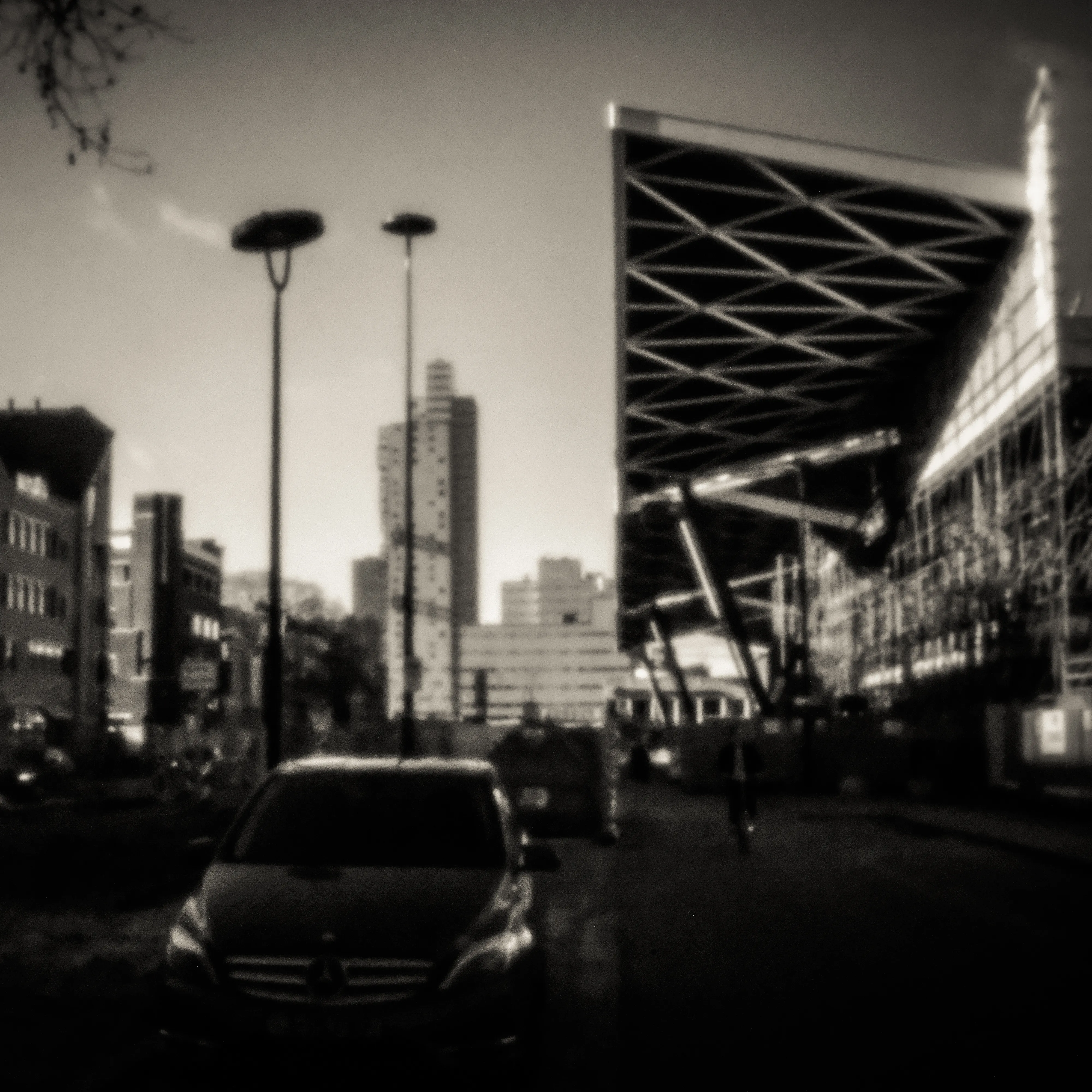 Station canopy and street lamps in dreamlike pinhole light