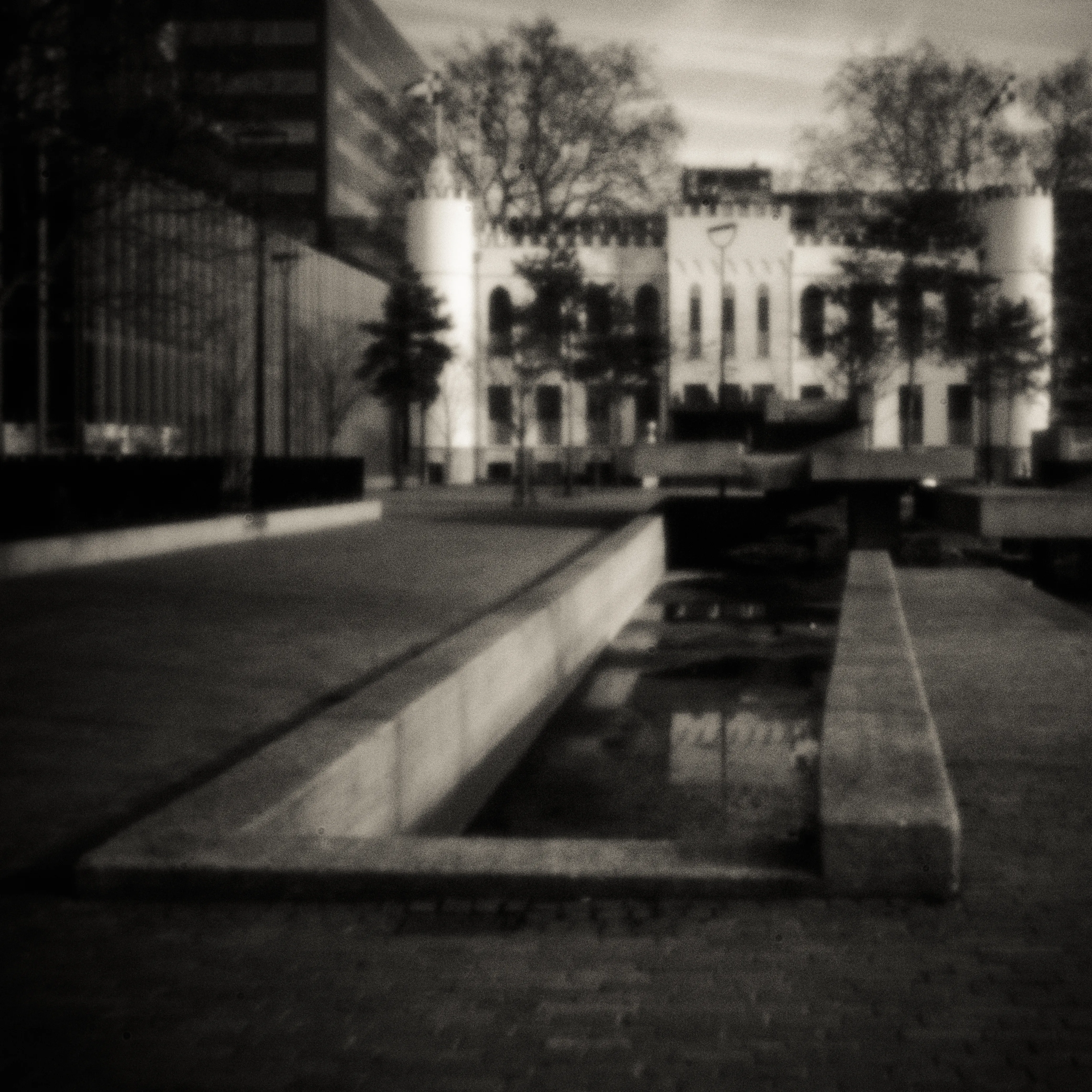 City building with water in the twilight